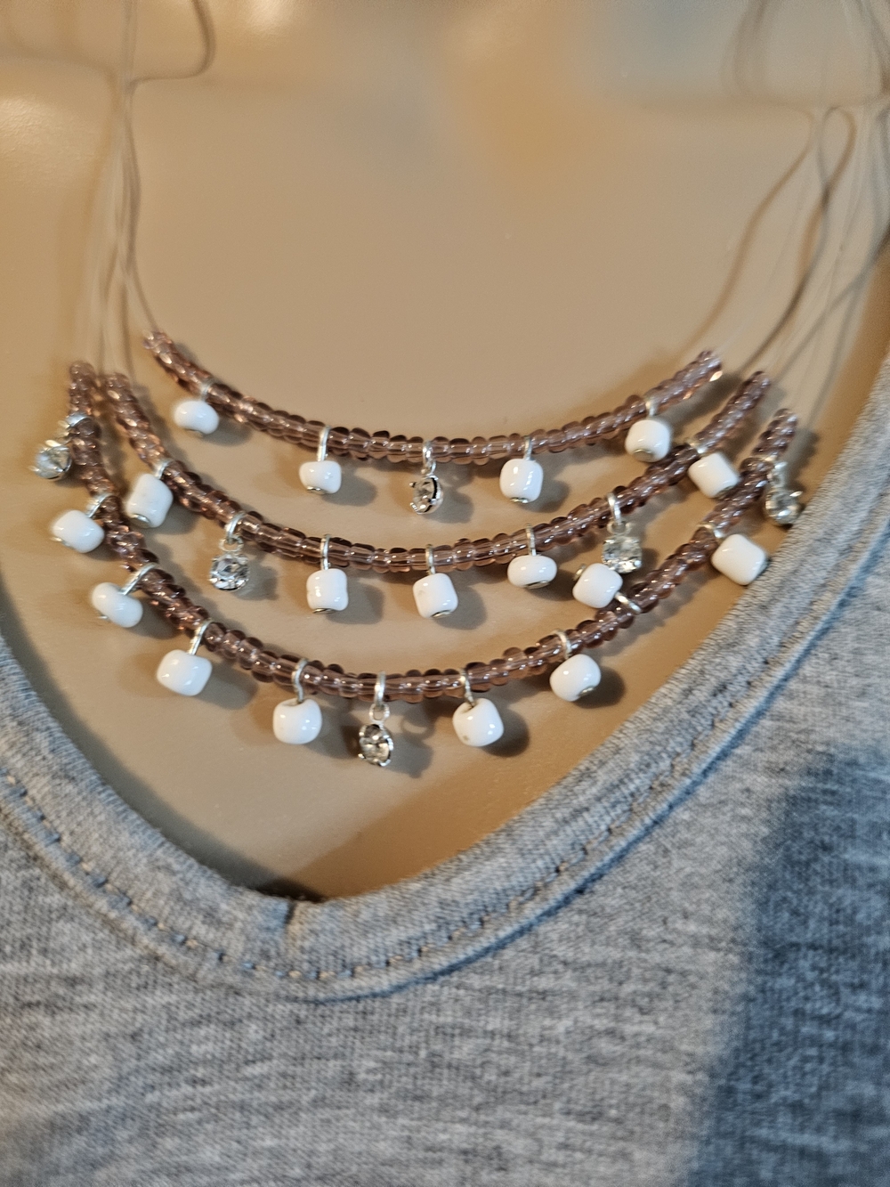 Layered Brown Beaded Necklace with White Drop Accents